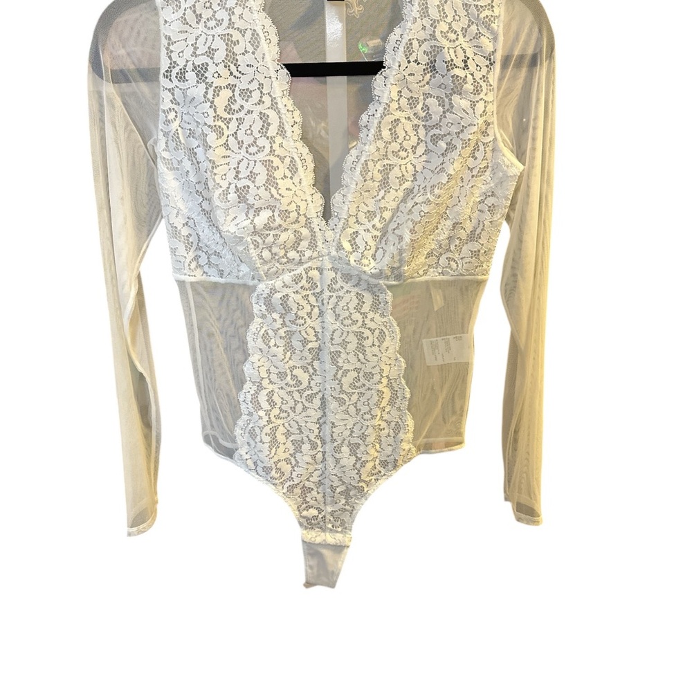 Cream Asymmetrical Cut Out Bodysuit with Long Sleeves
